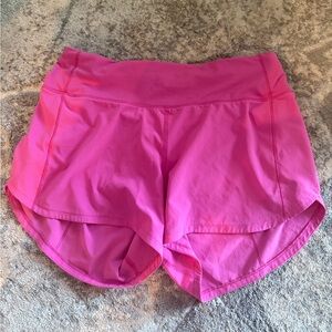 Sonic pink lululemon speed ups.